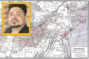 A headshot of a Black man with a beard is overlaid on a map of routes of the Underground Railroad criss-crossing the United States.