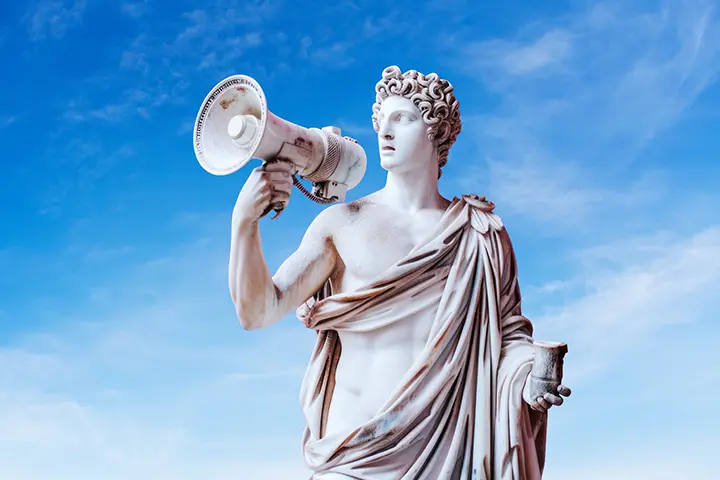 Stock photo of a classical sculpture holding a megaphone