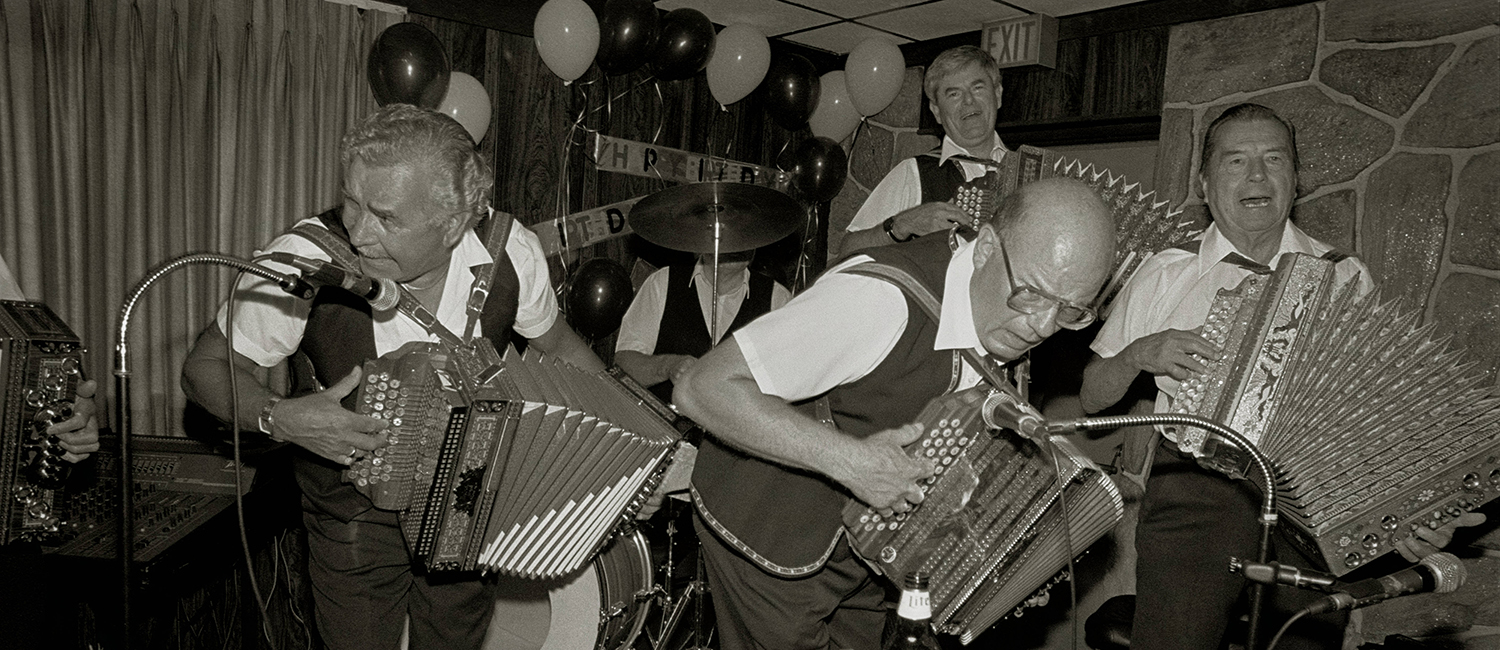 Image of four accordion players in polka band