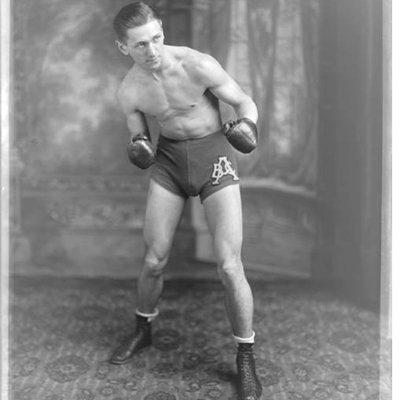 Cropped image of boxer in photo studio