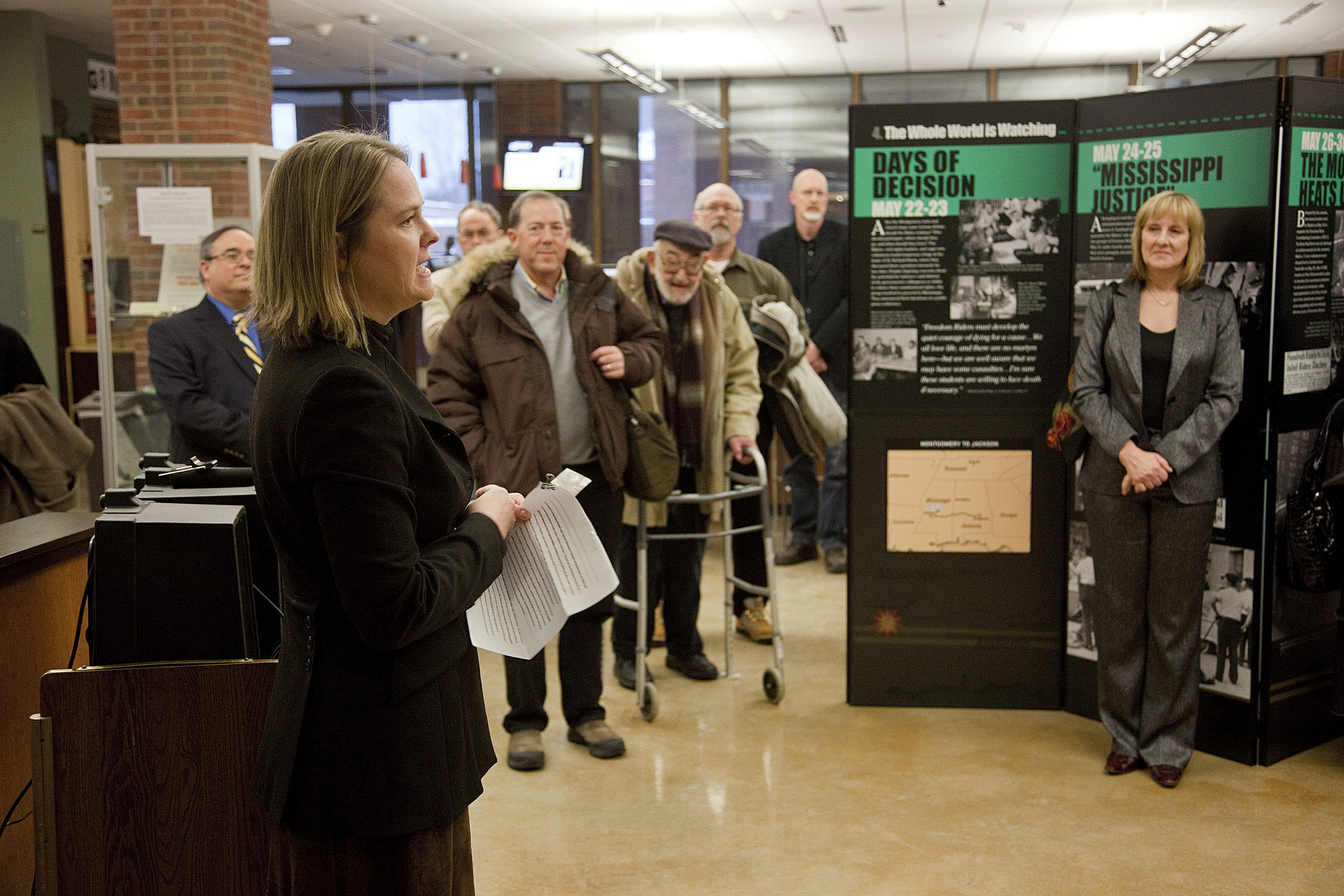 Photo: UWM History professor Jasmine Alinder gave introductory remarks at the opening of the photo exhibit, "Freedom Riders" in the Golda Meir Library.