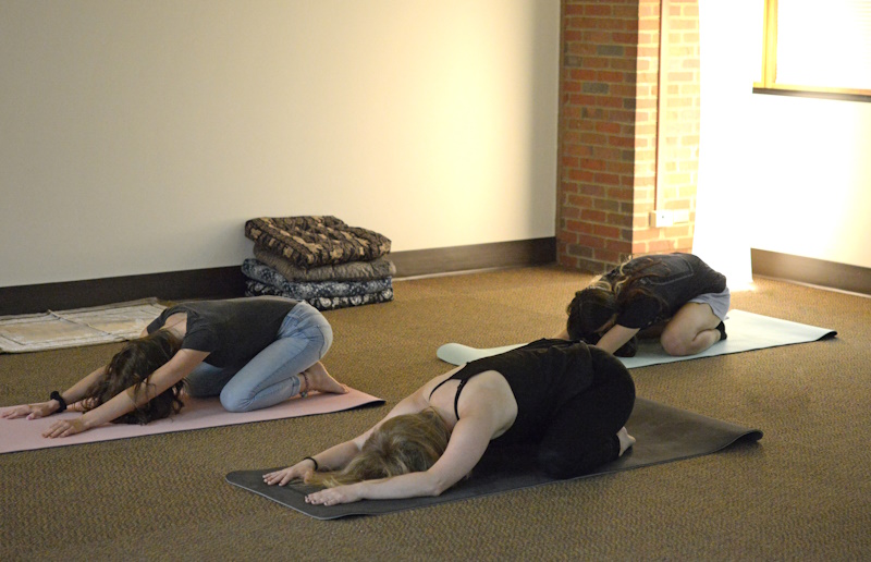 photo of students practicing yoga