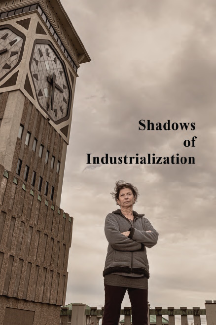 Photo of woman and Allen Bradley Clock with text Shadows of Industrialization