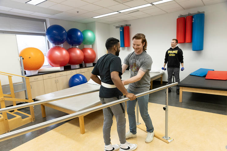Doctor of physical therapy student works with a client.