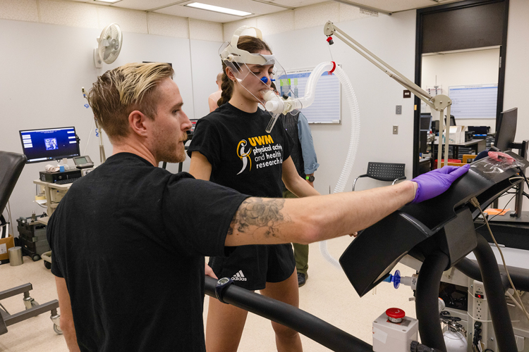 Kinesiology students conduct research in the lab.