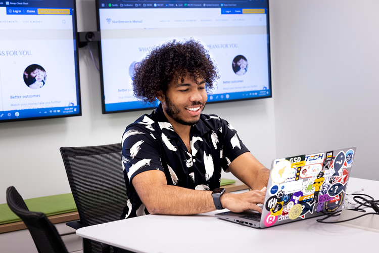 Kenneth working at his computer.