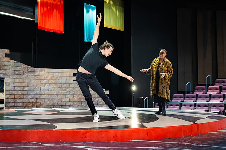 A theatre student receiving feedback from their mentor.