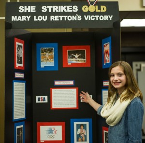 Trevor Grade School eighth grader Jessica Zeitler shows off her History Day presentation on Olympic gymnast Mary Lou Retton. 
