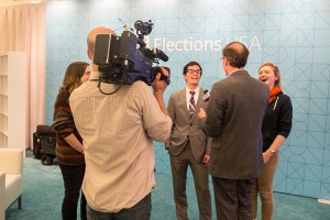 UWM students Katy DeZellar, Jack FitzGerald and Sarah Benforado, who watched the Democratic debate live, speak about the experience with reporters. (UWM Photo/Elora Hennessey)