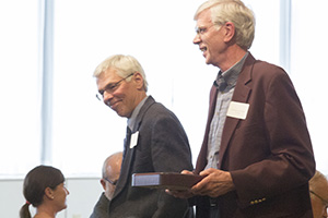 J. David Hoeveler, left, professor of history, and David Petering, professor of chemistry/biochemistry, each received an award for 45 years of service. (UWM Photo/Troye Fox).