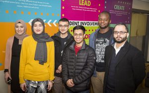 Members of the executive board of the Muslim Student Association, which helped organize Kareem Abdul-Jabbar's visit to Milwaukee, include (from left); Breeha Shah, Ala Abdeljaber, Omar Saleh, Osama Choudhry, Oluwatobi Amida and Imran Salha, religious adviser. (UWM Photo/Derek Rickert)