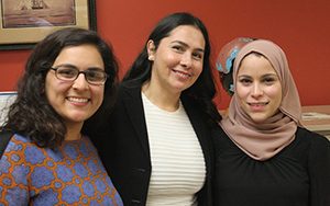 Salma Abadin (from left), Tatiana Maida and Alaa Murabit discussed global and local perspectives on peace, stability, justice and health at a panel discussion held in the American Geographical Society Library. (UWM Photo/Greg Walz-Chojnacki)