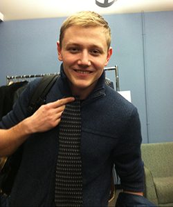 Stan Klimchuk, senior in mechanical engineering, found a nice tie in the Career Closet. (UWM Photo/Kathleen Quirk)