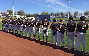 The UWM Panthers line up for the national anthem before taking on the Milwaukee Brewers at Maryvale Baseball Park in Phoenix on Friday. (UWM Photo)