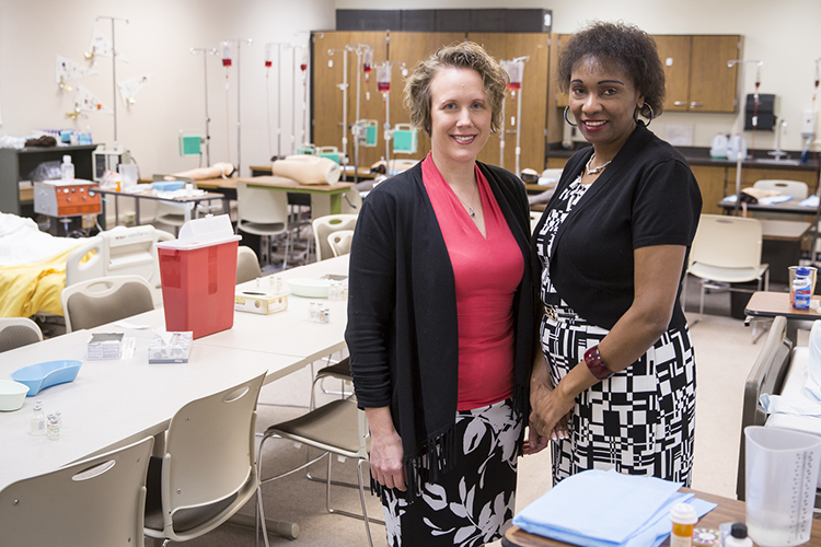 Jennifer Doering (left), UWM associate professor of nursing, and Jennifer Kibicho, assistant professor, are key players in a new service that expands access to mental health treatment for pregnant women and new mothers. (UWM Photo/Derek Rickert)