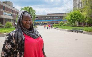 Jameelah A. Love stands near Spaights Plaza on the campus of UWM.