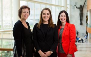 Stephanie Denzer, Holli Johnson and Kelli Passalacqua pose at the Mayo Clinic in Rochester, Minnesota.