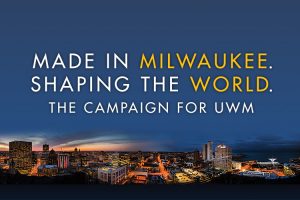 Text reads "Made in Milwaukee. Shaping the World. The campaign for UWM." over a photograph of UWM's campus and the Milwaukee skyline at dusk.