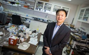 Junghon Chen stands in his lab.