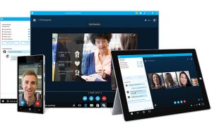 A skype video conversation displayed in a desktop browser window, on a tablet and on a smartphone