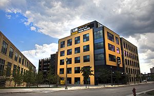 A picture of the outside of the Zilber building.
