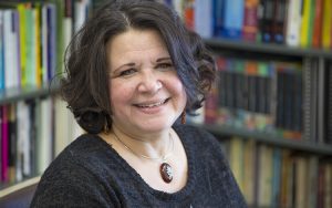 A woman poses for the camera.