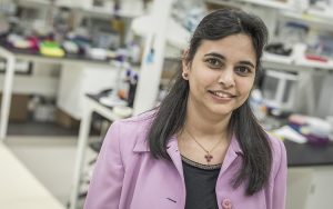 Shama Mirza stands in her lab.