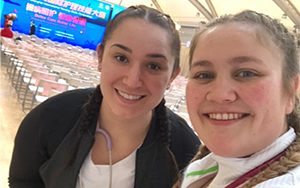 Two women pose for a selfie.