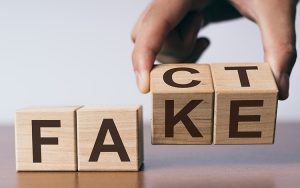 Picture of blocks that have letters spelling fake