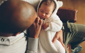 Image of father with baby.