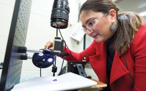 Professor Masha Ranji looks at cells with fluorescent imaging tech