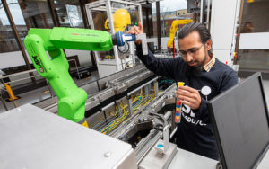 A man works inside the CSI testbed at UWM.