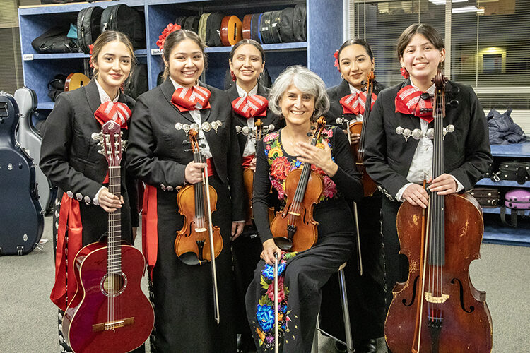 Alum passing along the magic of music to youth with Latino Arts Strings