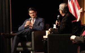 Paul Ryan listening to a question being asked by UWM Charlie Sykes