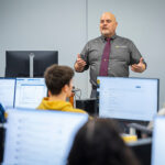 UWM mechanical engineering grad student Telemachos Agoudemos teaches a class of undergrad engineering students.