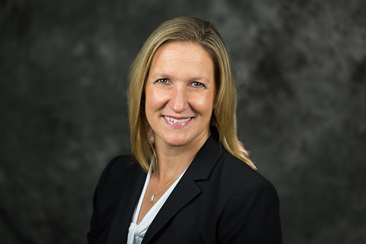 A head and shoulders portrait of UWM atheltic director Amanda Braun.