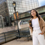 MBA student Patricia Gunawan walks across a bridge in downtown Milwaukee