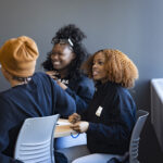 Students from Milwaukee's Tenor High School enjoy an ice breaker event.