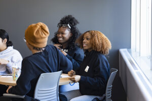 Students from Milwaukee's Tenor High School enjoy an ice breaker event.