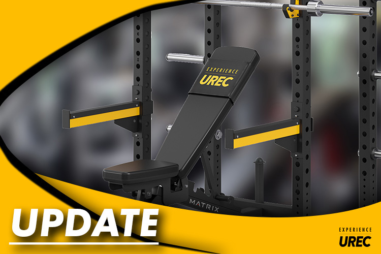A photo of a weight bench with "Update"