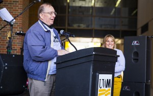Jim Cheski, who drew the first Panther image adopted as UWM's mascot, addresses the crowd during the dedication of the Panther statue on Nov. 10, 2015 outside Golda Meir Library. (UWM Photo/Derek Rickert)