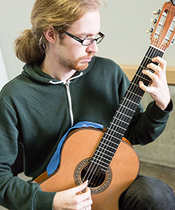 Nathan Bredeson came to UWM to study classical guitar after finishing his undergraduate degree at the University of Ottawa. (UWM Photo/Troye Fox)
