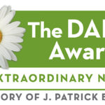 The Daisy Award for Extraordinary Nurses: In Memory of J. Patrick Barnes Logo with white Daisy