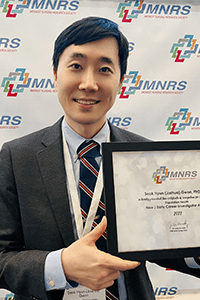 Joshua Gwon with Award at MNRS