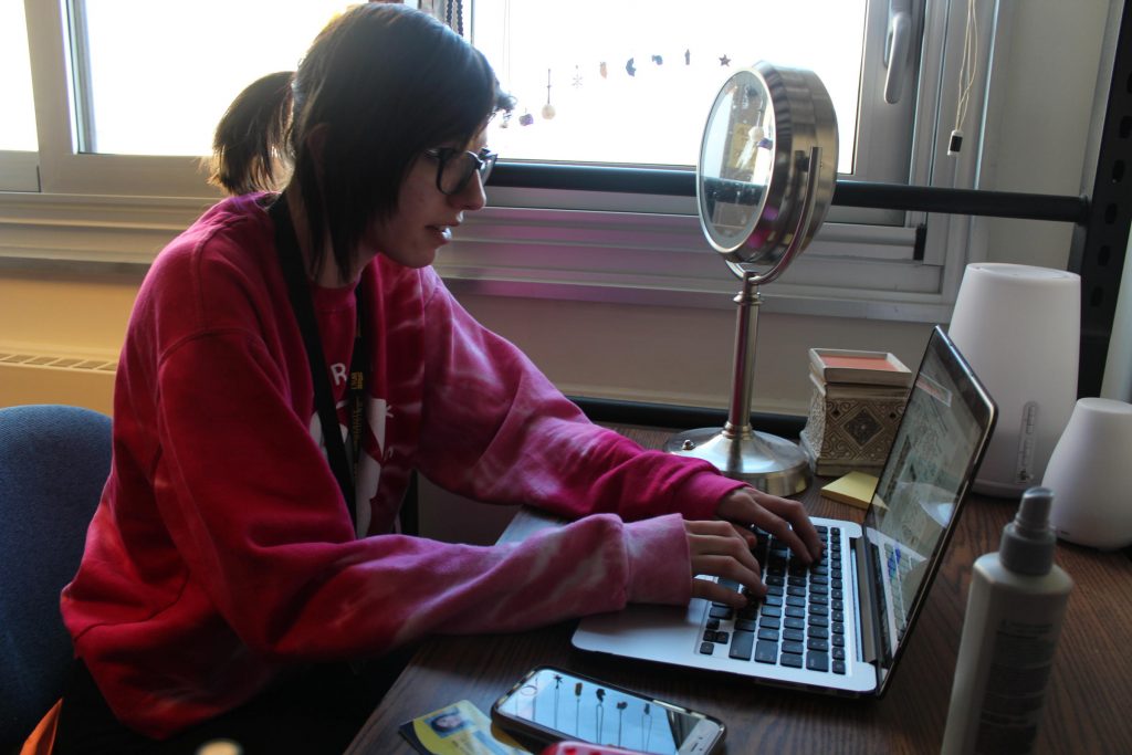 UW-Milwaukee freshman Kaylee Yelk does research for an astronomy group right from her dorm room on campus. Photo: RACHEL MORELLO