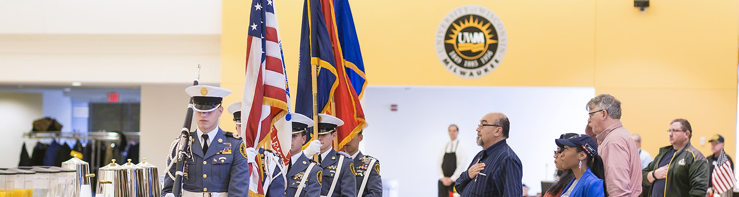 Color guard presents colors at military event on UWM campus