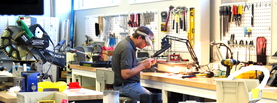 Image showing JD Lang working at one our work benches