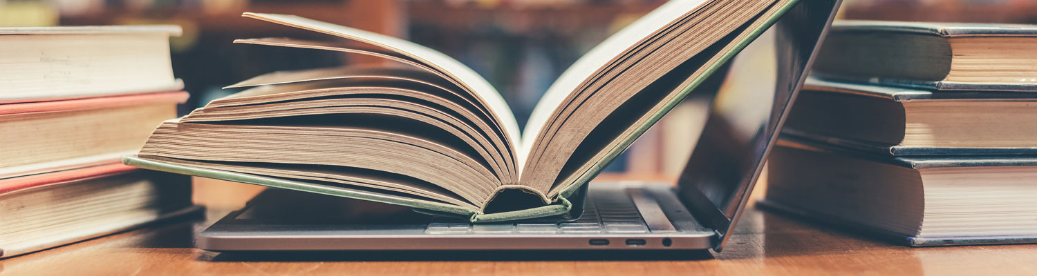 book on laptop