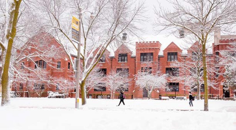 UWM campus building in winter with snow