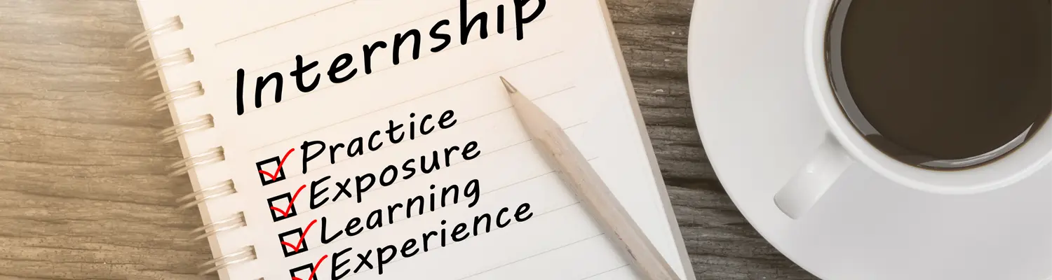 Notebook and coffee—notebook lists practice, exposure, learning, and experience under Internship heading